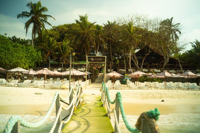 A Day to Private Island Luxury Beach Club with Food - Food and Drinks at the Beach Club: Lunch, Included Beverages, and Package Gotchas