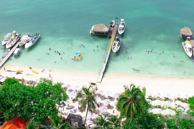 A Day to Private Island Luxury Beach Club with Food - The Private Island Luxury Beach Club Setup: Beds, Shade, and Sea Time