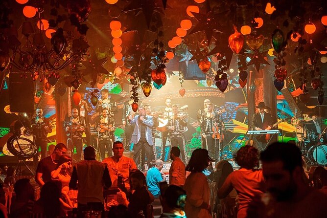 A Night Out in Medellin with Dinner and Drinks Included - Dinner and Live Mariachi: How the Evening Flows