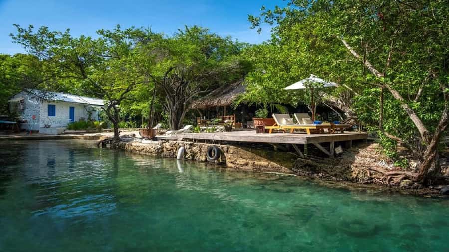 Cartagena: Coralina Island Day Trip with Lunch - Coralina Island check-in: welcome drink, rules, and day-pass facilities