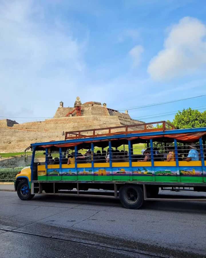 Cartagena: Explore with a city tour aboard a typical "chiva". - Panoramic drive plus photo stops: Cartagena Letters, Old Shoes, and Castillogrande Bay