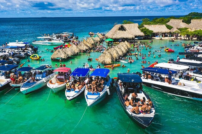 Cartagena Island Hopping: 5-Stop Rosario Islands Tour with Lunch - Rosario lunch stop: beds, parasols, and real food choices