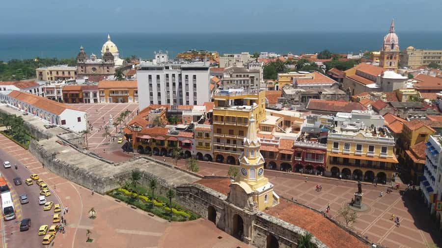 Cartagena: Private Walking Tour with German or Italian Guide - Entering Cartagena Through the Clock Tower
