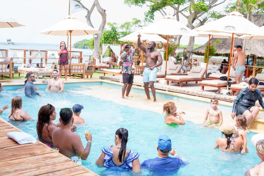 Cartagena: Rosario Islands Daypass Ibbiza Island Beach Club - Arriving at Ibbiza Island Beach Club: welcome drink, loungers, and the DJ vibe