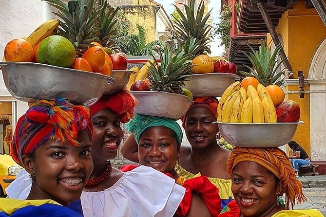 Cartagena Street Food Adventure & Full City Tour with Local Guide - Entering the Walled City: UNESCO walls, churches, plazas, and the best kind of orientation