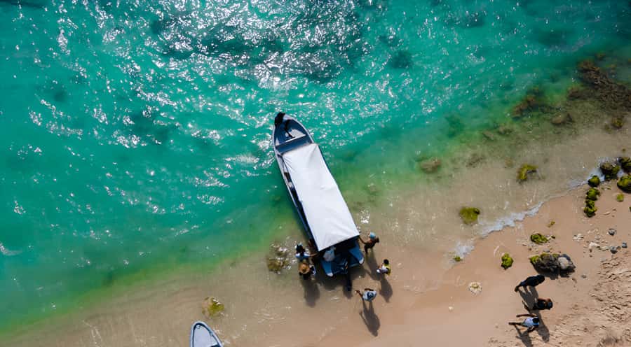Cartagena: Tour to Playa Tranquila with Snorkeling + Luminous Plankton and Parasol - Key highlights at a glance