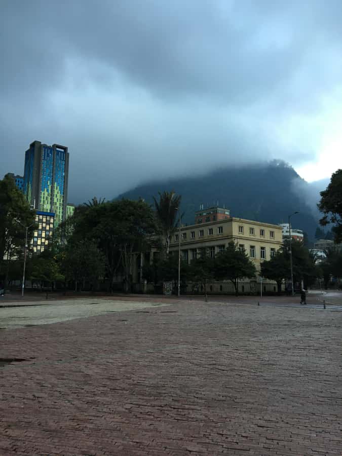 Complete Walking Tour in Bogota's Downtown - Chorro de Quevedo Plaza: Street Snacks and a Traditional Dance Moment