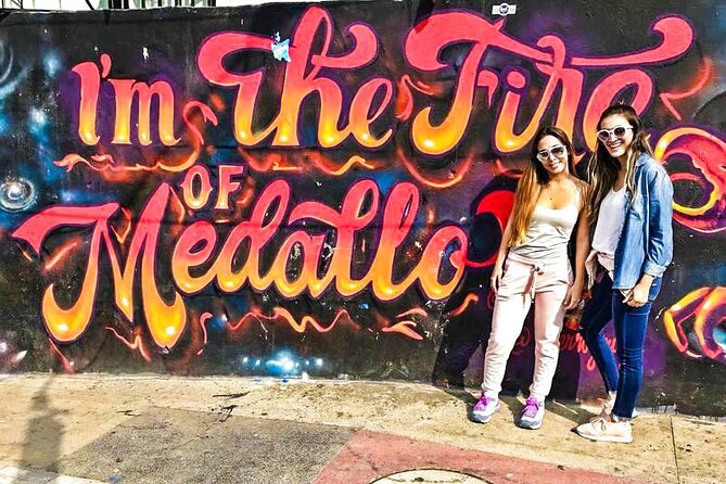 Comuna 13 Graffiti Tour Medellin l Private Tour - Stop 2 in Comuna 13: Metro Cable Views and the Civil War Impact