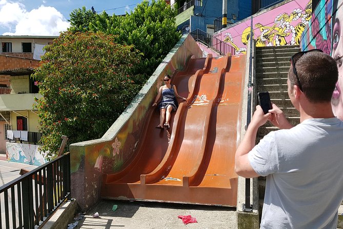 Comuna 13 Graffiti Tour with Metrocable - Stop 2: Comuna 13 electric escalators, street art, and street-snack freedom