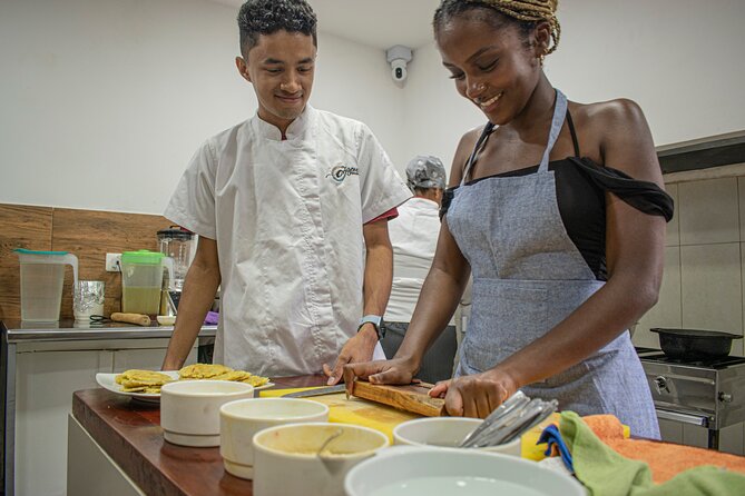 Cooking Class In A Real Restaurant At Old City - From coconut rice to patacones, you cook the base of the meal