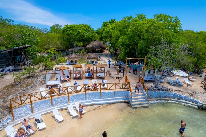 Discover Isla del Rosario Live The Enchanted Beach Experience - Isla Grande and Encanta Beach: The Beach-Club Transition