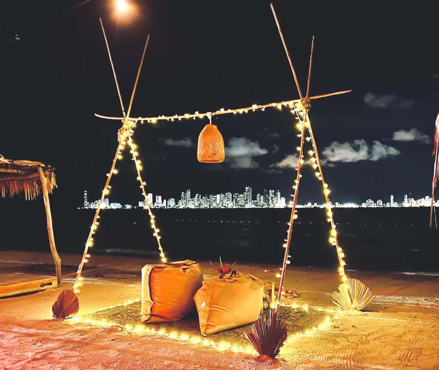 Fenix Beach Island Dinner - Sand Mandalas, Phoenix-Wing Doors, and Photo Spots That Actually Mean Something