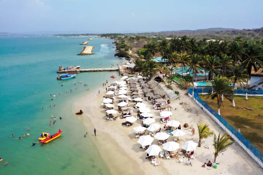 From Cartagena: Palmarito Beach With Buffet Lunch And Pool - The ride itself: quick island crossing, with a real-world caution