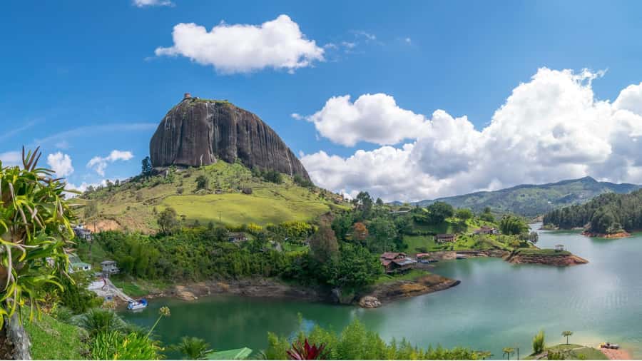 From Medellín: Paragliding Flight and Guatape Tour - Cocorná scenery: mountains and waterfalls from above