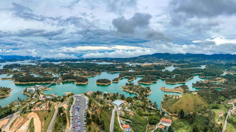 From Medellín: Paragliding Flight and Guatape Tour - Guatape city tour: colorful streets, local heritage, and time to wander