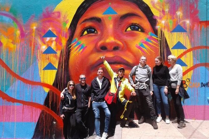 Graffiti Tour in La Candelaria Bogotá with Transportation - The narrow streets and the indigenous ancestry mural stop