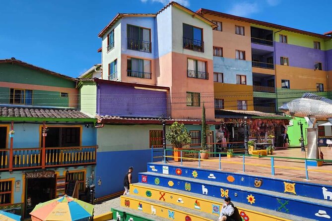 Guatapé and Peñol Private Full Day Tour from Medellín - Peñol town passing viewpoint: Phoenix sculpture and Tomato Park