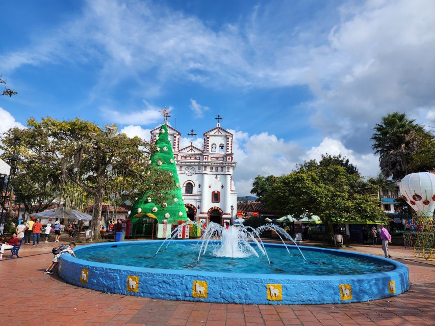 Guatape Coffee Villa including Rock Town & Waterfall - Paisa lunch by the lake, then Guatape’s colorful town plaza