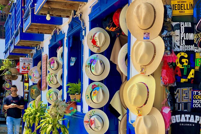 Guatapé Full Day Tour - Piedra del Peñol with meals & boat tour - Zócalos plaza and Guatapé’s parasol street photo time