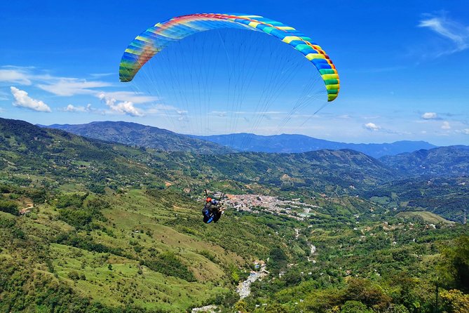 Guatape & Paragliding & El Peñol Rock & Quaint Town From Medellin - Price and value: what $203 includes, and what you must budget on your own