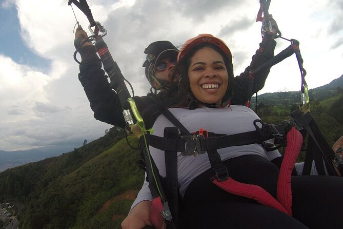 Guatape Private Adventure Tour with Paragliding - Stop 1 in Medellín: the paragliding flight with waterfall views