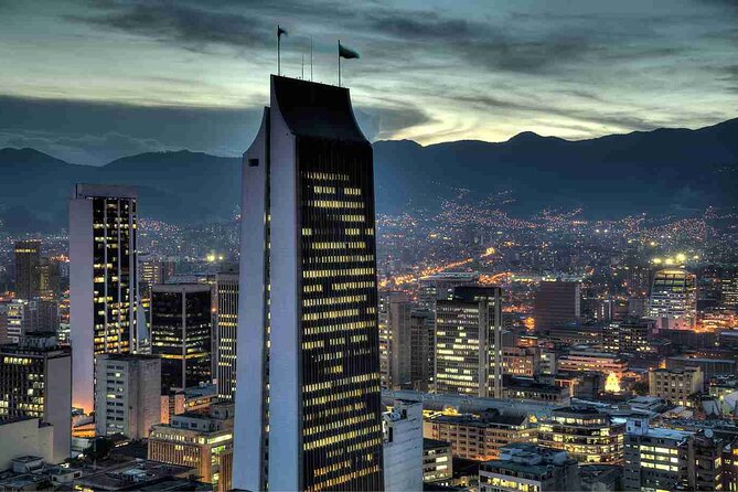 Half Day Private Medellín City Tour with Transportation - Berrio Metro Station walkway mural, then metro cable views up high