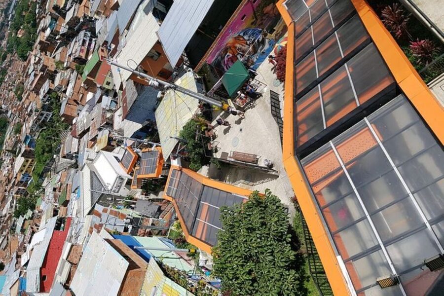 Medellín: 5.5-Hour Guided Private City Tour - Comuna 13 street life: shops, street art, and a patient guide