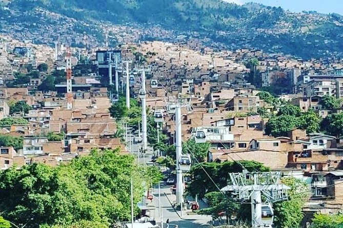 Medellin City Walking Tour plus Metro Cable Cars - Metrocable to Santo Domingo Savio Library: city transit with skyline views