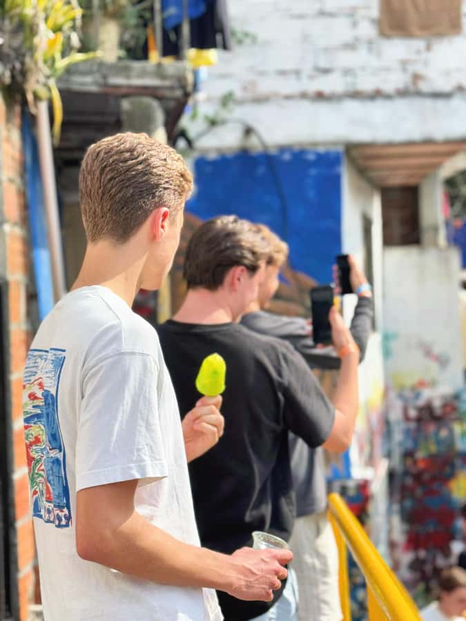 Medellín Comuna 13 local guides snacks and your own graffiti - Comuna 13 is more than murals, it is a neighborhood with a timeline
