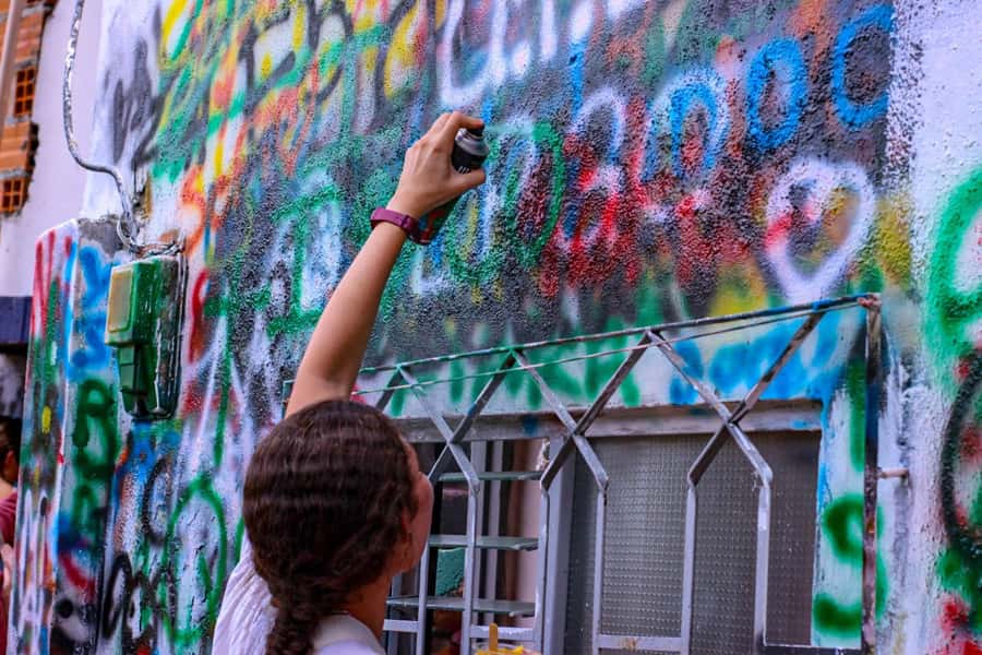 Medellín Comuna 13 local guides snacks and your own graffiti - Local snacks, ice cream, and art galleries with working artists