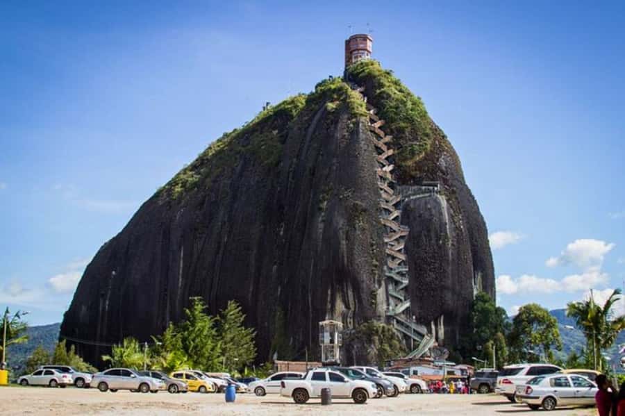 Medellin: Guatape and El Penol Rock Day Trip with Boat Ride - Réplica del Peñol and the dam area: the story behind the water