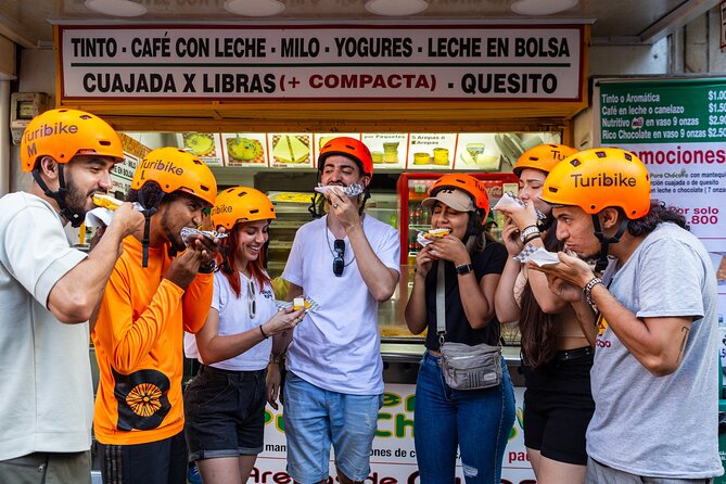 Medellín: Local neighborhoods and included food on e-bike - Laureles monument stop: quick photo moment with a story