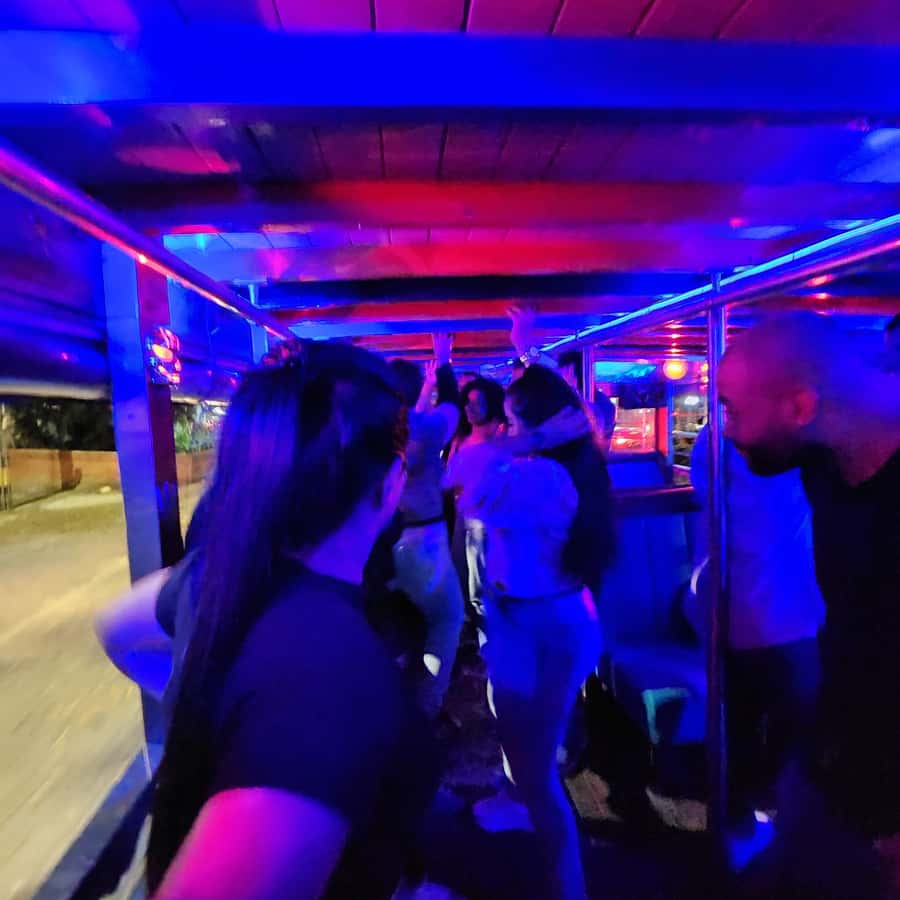 Medellin: Party Bus with DJ & Street Food Tastings - The Golden Mile (Milla de Oro): Views, Hotels, and Easy Cruising