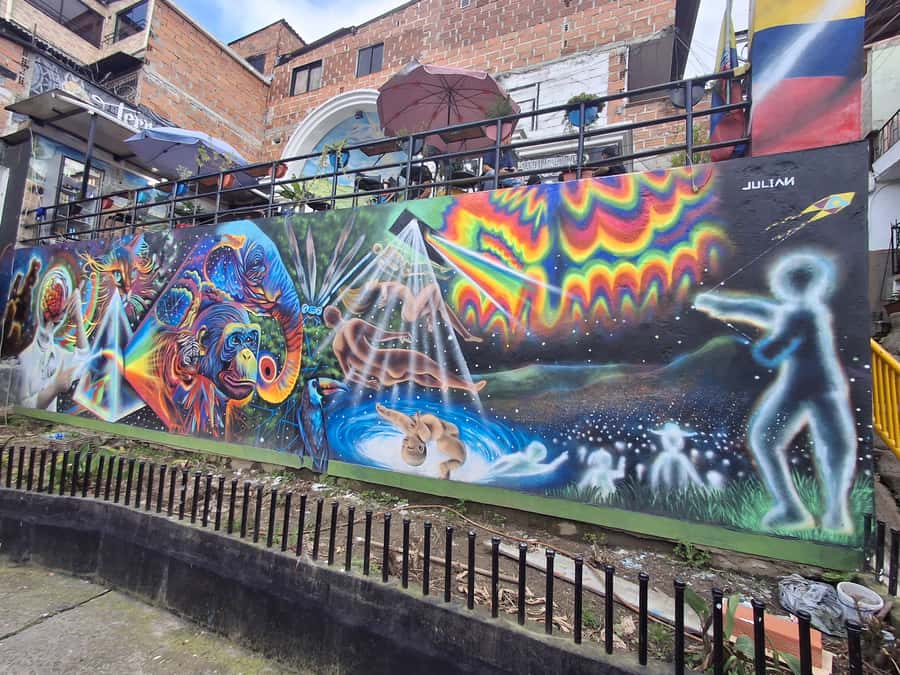 Medellin: Tour Pablo Escobar y Comuna 13 Privado - Comuna 13 Graffiti Tour: Meaning Behind the Murals and the Views on the Way