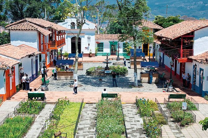 Medellín Tour: Themed Vehicles, Tram Ride and Metrocable - Pueblito Paisa: the 360 viewpoint, Nutibara’s colonial replica, and quick wandering time