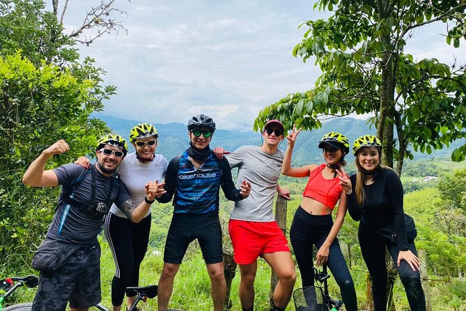 Mountain Bike Tour with Coffee and Lunch in Antioquia's Beautiful Landscapes - Los Palomos downhill ride: waterfalls, bridges, tunnels, and viewpoints