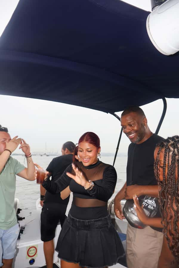Nightlife: sunset boat party + tour of the old town - Two hours on the bay: open bar, music, games, and dancing