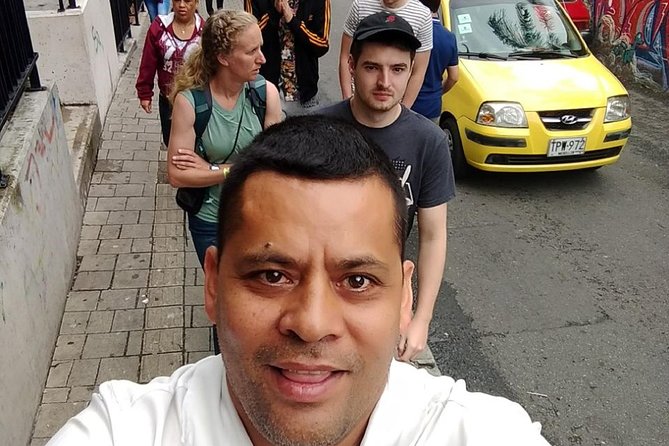 Pablo Escobar and Comuna 13 Small-Group Half-Day Tour - Barrio Pablo Escobar: why some residents remember the housing he paid for, and what it cost the city