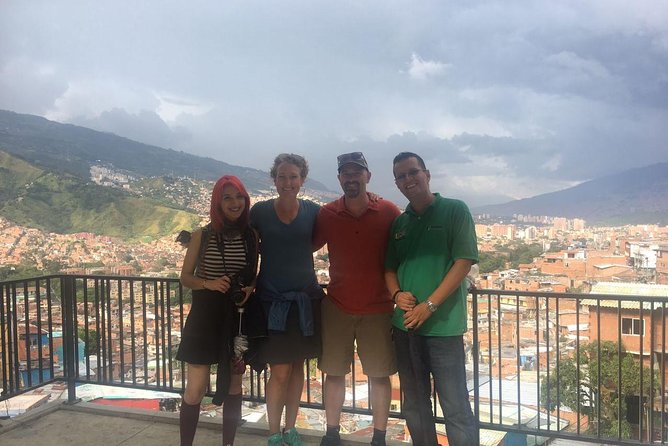 Pablo Escobar and Comuna 13 Small-Group Half-Day Tour - Meeting point in El Poblado and how the minivan time feels