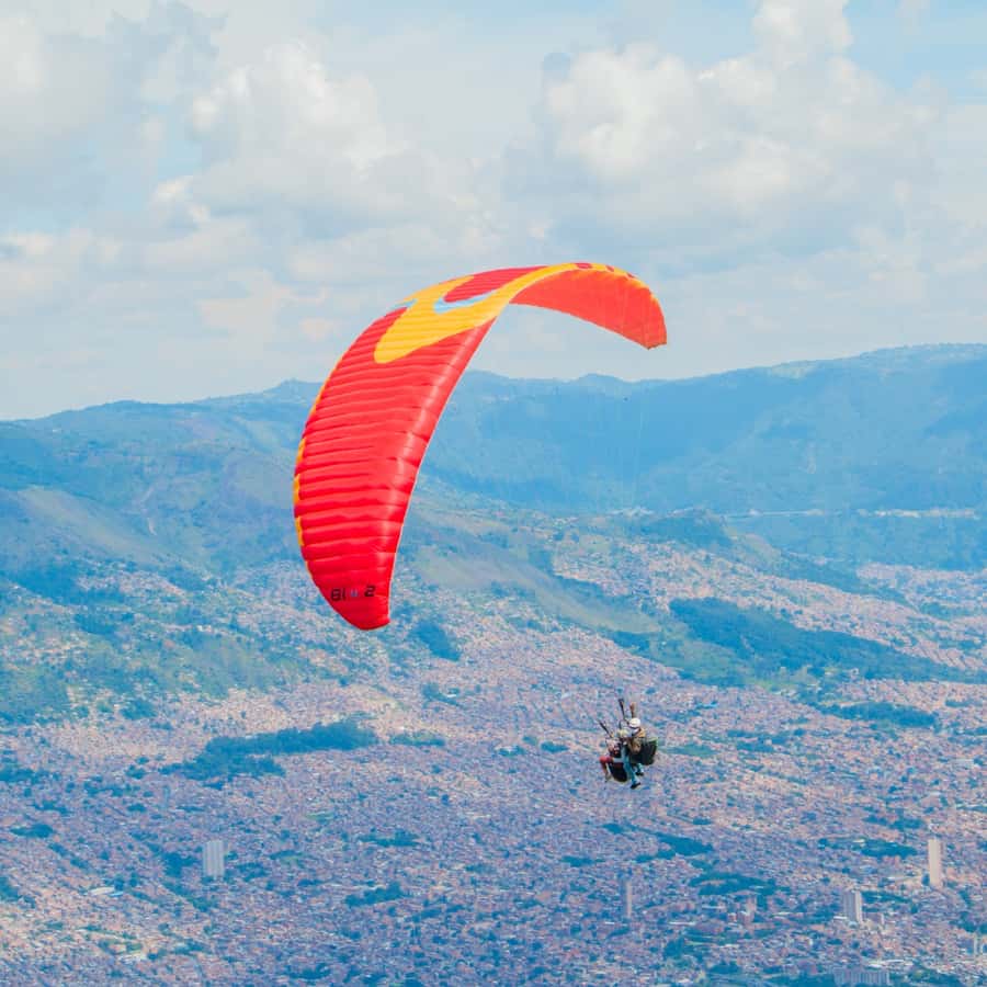 Paraglide over beautiful Medellin - The Coffee Side of the Day: Breakfast, Farmer Clothing, and Hands-On Grinding
