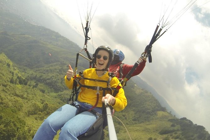 Paragliding Adventure with Transportation and Gopro Videos HD - Medellín to Bello: the two-part view you actually came for