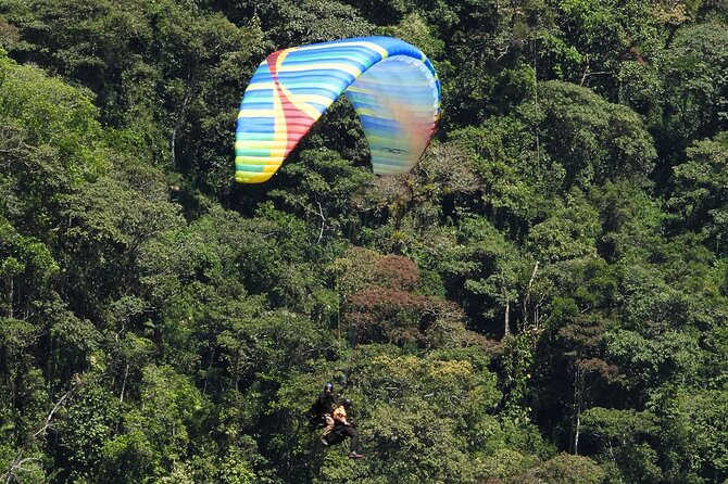 Paragliding and River Tubing private experience from Guatape - San Rafael Timing: Use the Lunch Break Well