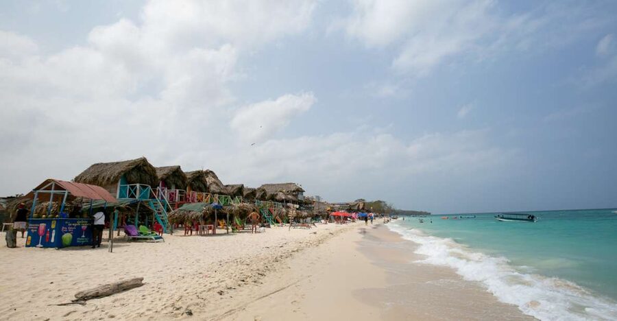 Playa Blanca Full-Day Trip from Cartagena - Crossing to Baru and Arriving at Playa Blanca’s White Sand