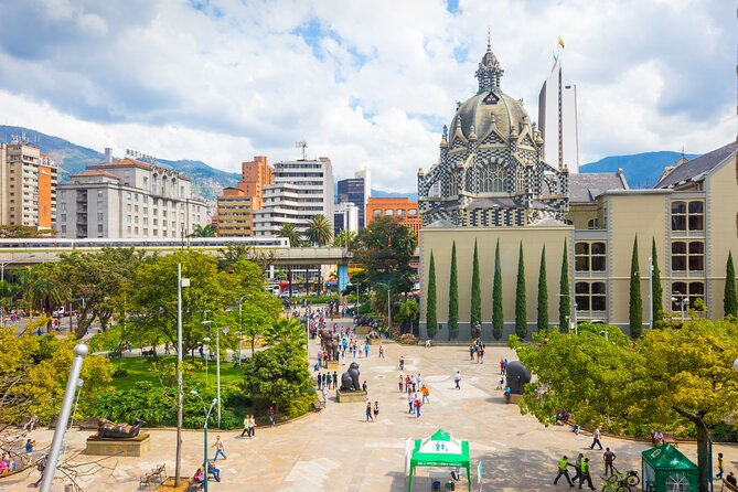 Private City Tour of Medellin with Metrocable and Commune 13 - Parques del Río and the Medellín Center: Start Where the City Feels Walkable