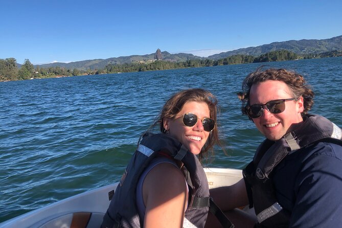 Private Guatape +Boat Ride+Paragliding Flight+Animal Farm - Guatapé town walk: colorful baseboards and an easy cultural rhythm