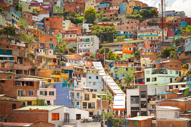 Private Tour in Pablo Escobar and Comuna 13 with Cable Car - Barrio Pablo Escobar: Community Museum, Local Souvenirs, and Real Context