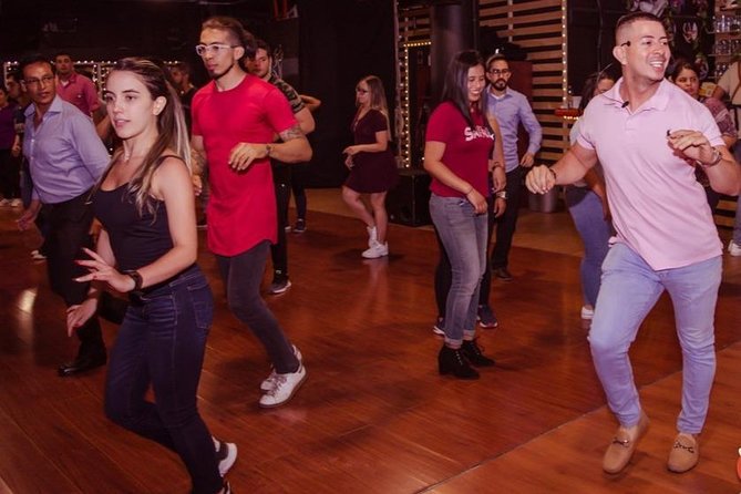 Salsa & Bachata in Medellín with Bryant - Medellín starts at Estadio Atanasio Girardot, then turns into dance class