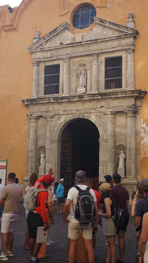 Shared Cartagena Old City Tour with Wireless Audio System - Plaza de los Coches and Plaza Bolívar: commerce, politics, and public life