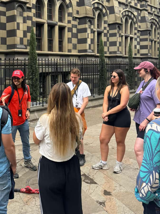 Shared Medellín Downtown Tour with Wireless Audio - Walking about 8 km: a doable route, but wear shoes you trust