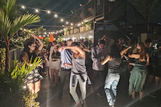 Street Food, Bars, and Rooftops in Poblado with a Local - Stop 2: Parque Lleras, Two More Snacks and the Night Takes Over
